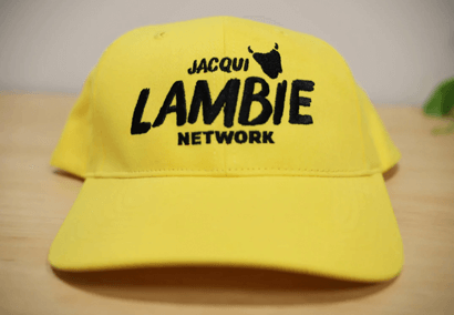 A poster of Jacqui Lambie eating a Dagwood dog with the slogan 'politicians don't have to suck.'
