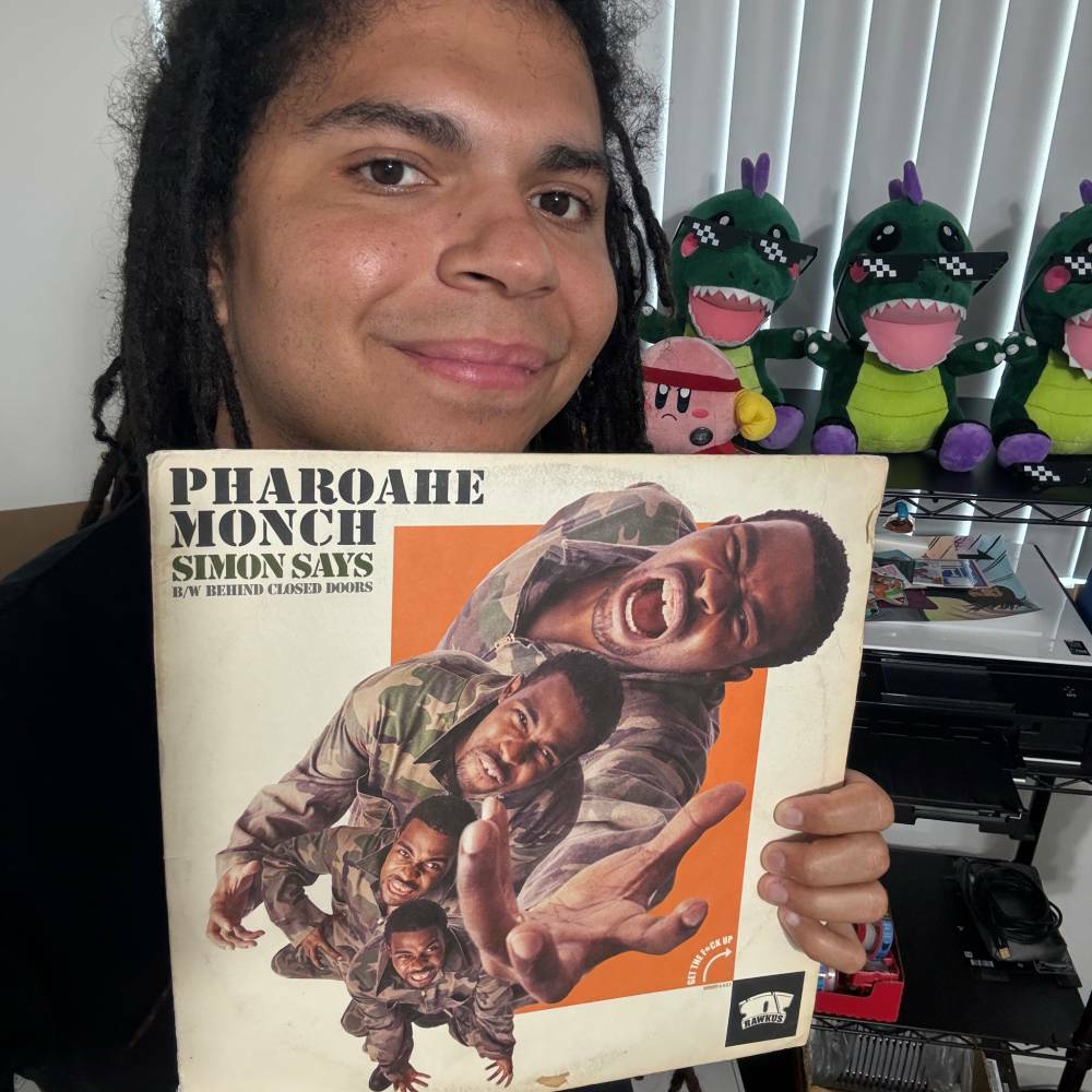 Groovy Kaiju Holding Their Copy of Pharoahe Monch - Simon Says on Vinyl in their Studio