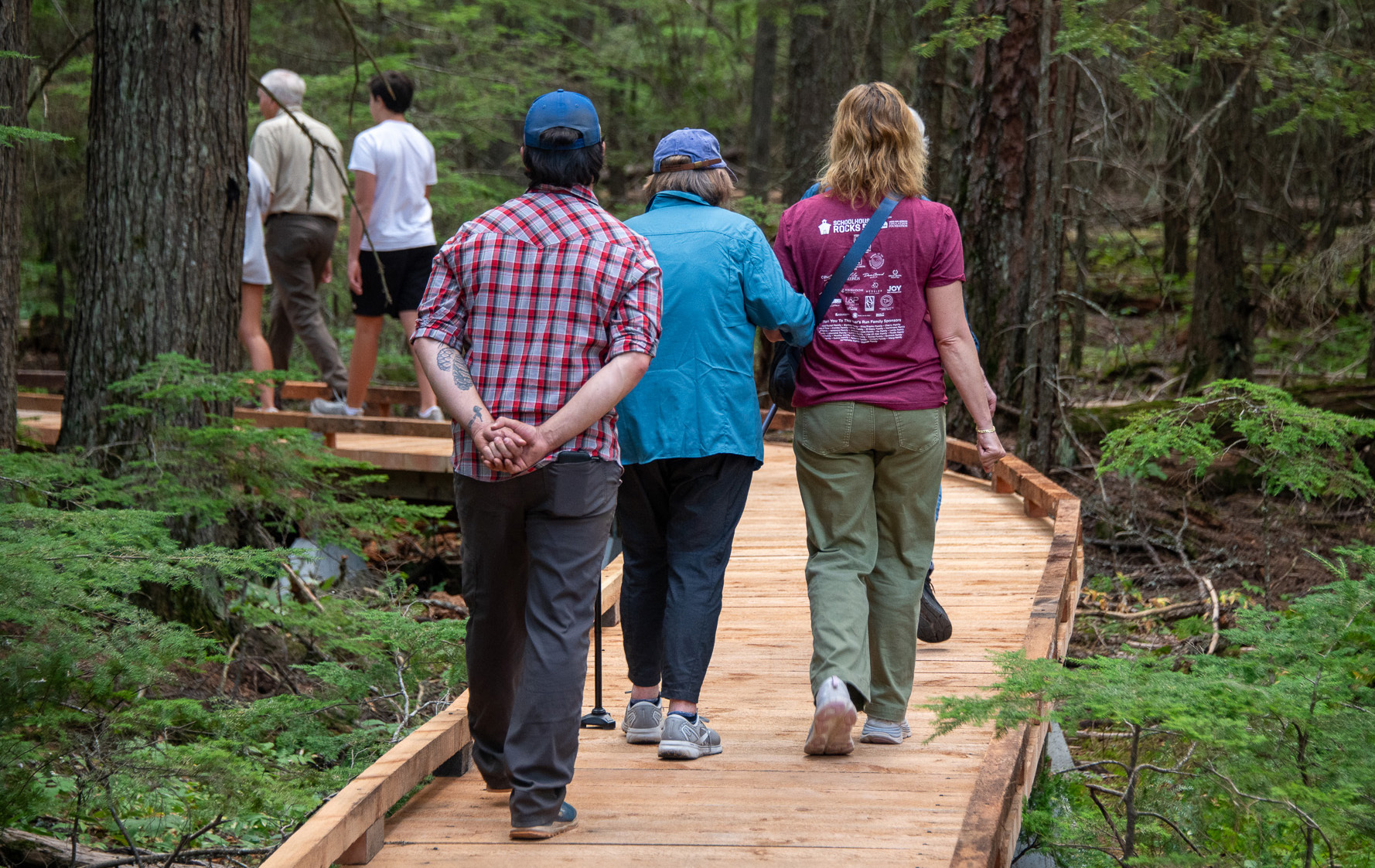 Hikers on a boardwalk