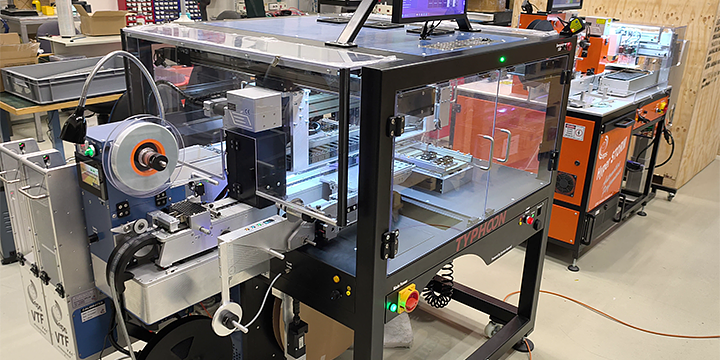 Automated programming equipment at an EPS Global facility